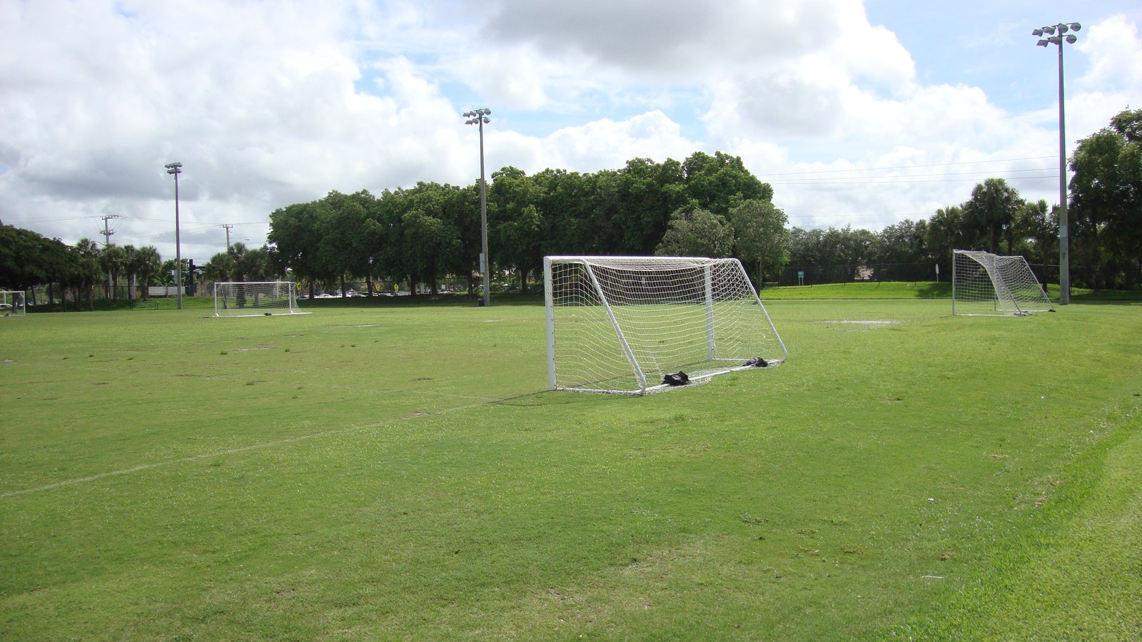 Silver Lakes North Park soccer field with goals, green open space, and shaded pavilion area in Pembroke Pines, Florida
