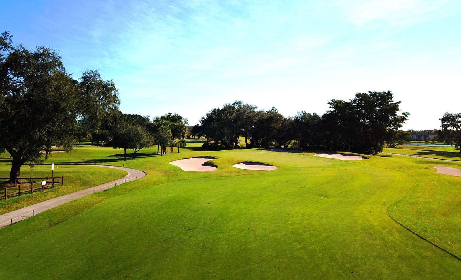 Aerial view of Pembroke Lakes Golf & Racquet Club championship course with manicured fairways and greens in Pembroke Pines, Florida