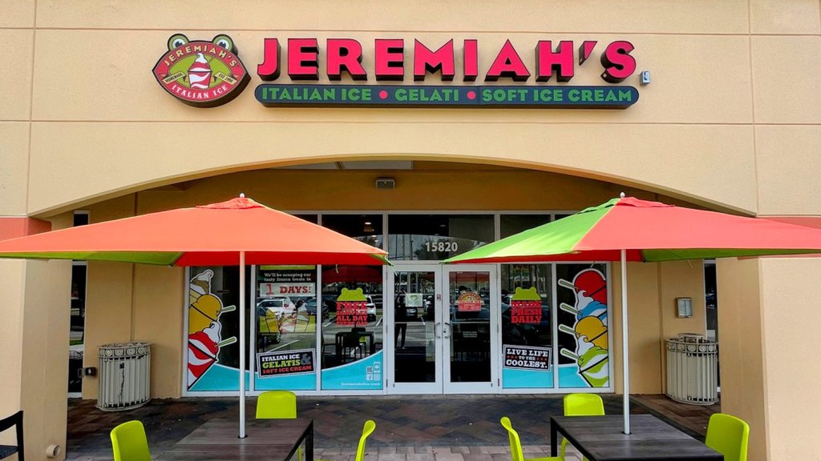 Jeremiah's signature Gelati — layers of colorful Italian ice and creamy soft serve in a clear cup, against the bright blue-and-orange Jeremiah's branding